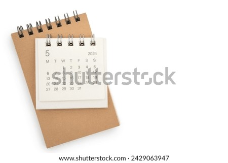 Simple desk calendar for MAY 2024 and blank memo isolated on white background. Calendar concept with copy space.