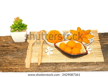 Pictures of dessert Thailand on bamboo mat put on old wooden,concept isolated picture.