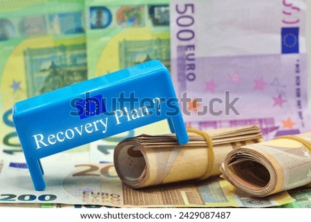 Doubts and uncertainties about the European Recovery and Resilience Plan against the crisis of the Covid virus pandemic - concept with european flag and question mark Royalty-Free Stock Photo #2429087487