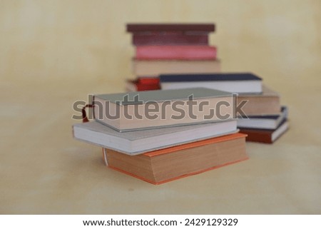stack of books, education and learning concept