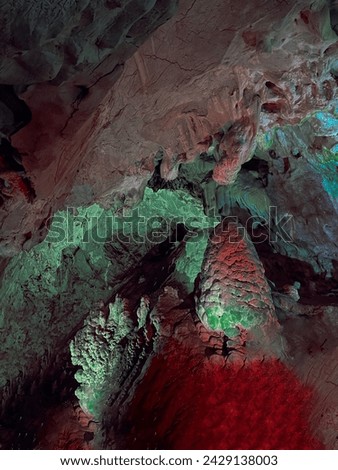 green red texture of rock stone ladder cave
