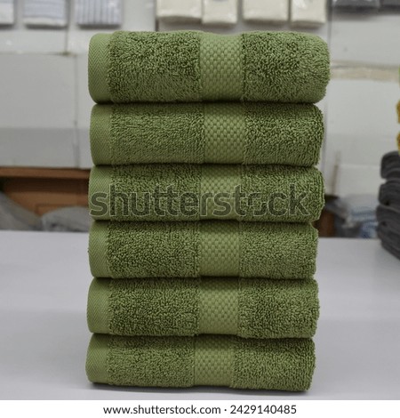 Photograph washcloths neatly packed in a travel bag, emphasizing their compactness and convenience for on-the-go lifestyles.
