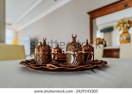 Old Vintage Copper Ottoman Turkish Tray and Tea Cups on a Table, Golden Brown Turkish Tea cups and tray