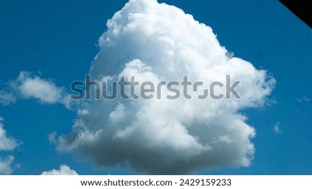 Shape of clouds in a deep blue sky