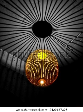 A beautiful fashionable light in a restaurant. Creative light creates a beautiful pattern glowing up the restaurant and becomes a cozy attractive thing to shoot pictures. Pure form of abstract art. 