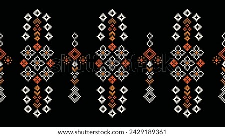 Traditional ethnic motifs ikat geometric fabric pattern cross stitch.Ikat embroidery Ethnic oriental Pixel black background.Abstract,vector,illustration. Texture,scarf,decoration,wallpaper.