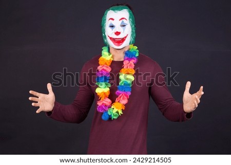 man dressed as a joker for carnival.