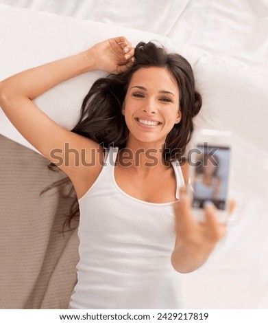 Woman, selfie and happy with above in bedroom on vacation, hotel or relax for photography on web blog. Girl, person and influencer for profile picture, home and live streaming in bed on social media