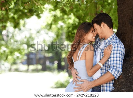 Love, hug and happy with couple in park for romance, bonding and summer vacation. Happiness, commitment and relax with man and woman embrace on date in nature for funny, support and relationship Royalty-Free Stock Photo #2429218223