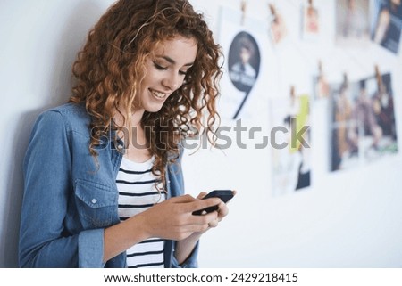 Happy woman, cellphone and email in office for networking and creative professional with work in agency. Editor, mobile app or social media for startup company or online review for magazine editing