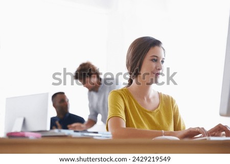 Woman, computer and desk in office for professional work, creative research or planning. Copywriter, editor or designer with technology and web at workstation for online at company or corporation