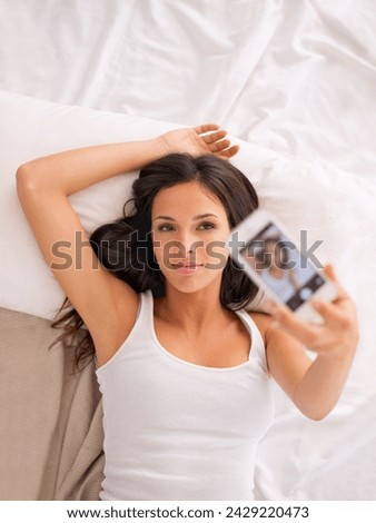 Woman, selfie and above bed in morning for vacation, hotel or photography for web blog with memory. Girl, person or influencer for profile picture, video or live streaming in bedroom for social media