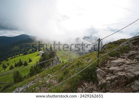 Hiking trail on the ,,Grosser Mythen" a beautiful mountain 1,898 m high in the canton of Schwyz in Switzerland.  Royalty-Free Stock Photo #2429262651