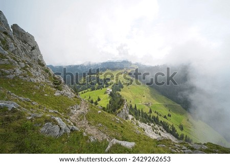 Hiking trail on the ,,Grosser Mythen" a beautiful mountain 1,898 m high in the canton of Schwyz in Switzerland.  Royalty-Free Stock Photo #2429262653