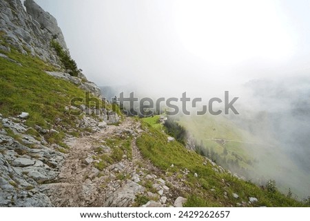 Hiking trail on the ,,Grosser Mythen" a beautiful mountain 1,898 m high in the canton of Schwyz in Switzerland.  Royalty-Free Stock Photo #2429262657