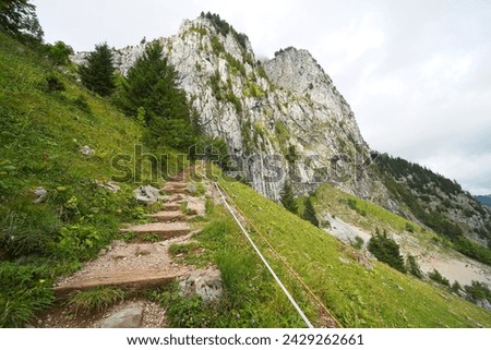 Hiking trail on the ,,Grosser Mythen" a beautiful mountain 1,898 m high in the canton of Schwyz in Switzerland.  Royalty-Free Stock Photo #2429262661