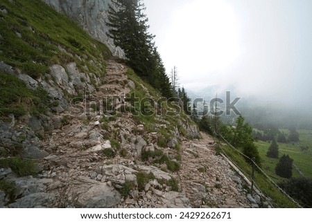 Hiking trail on the ,,Grosser Mythen" a beautiful mountain 1,898 m high in the canton of Schwyz in Switzerland.  Royalty-Free Stock Photo #2429262671