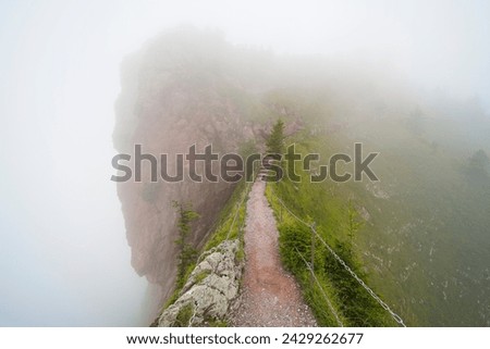 Hiking trail on the ,,Grosser Mythen" a beautiful mountain 1,898 m high in the canton of Schwyz in Switzerland.  Royalty-Free Stock Photo #2429262677