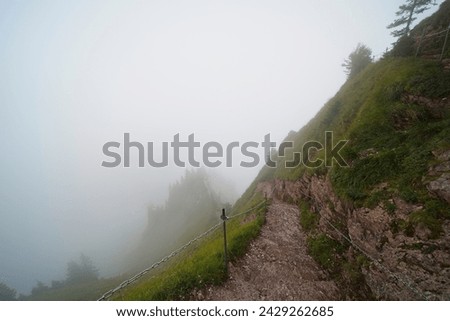 Hiking trail on the ,,Grosser Mythen" a beautiful mountain 1,898 m high in the canton of Schwyz in Switzerland.  Royalty-Free Stock Photo #2429262685