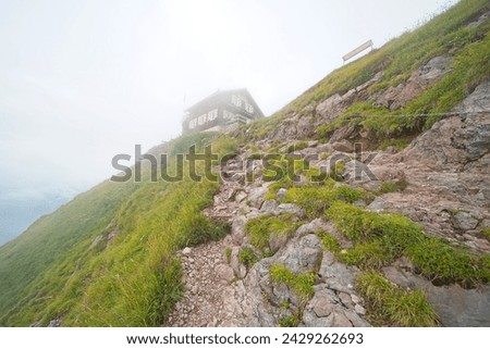 Hiking trail on the ,,Grosser Mythen" a beautiful mountain 1,898 m high in the canton of Schwyz in Switzerland.  Royalty-Free Stock Photo #2429262693
