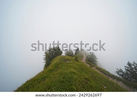 Hiking trail on the ,,Grosser Mythen" a beautiful mountain 1,898 m high in the canton of Schwyz in Switzerland.  Royalty-Free Stock Photo #2429262697