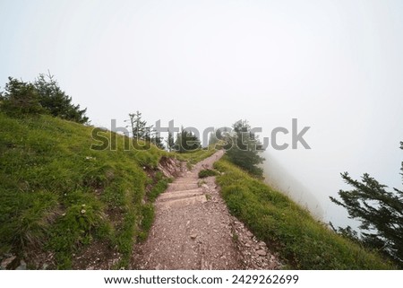 Hiking trail on the ,,Grosser Mythen" a beautiful mountain 1,898 m high in the canton of Schwyz in Switzerland.  Royalty-Free Stock Photo #2429262699