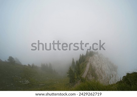 Hiking trail on the ,,Grosser Mythen" a beautiful mountain 1,898 m high in the canton of Schwyz in Switzerland.  Royalty-Free Stock Photo #2429262719