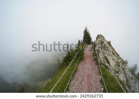 Hiking trail on the ,,Grosser Mythen" a beautiful mountain 1,898 m high in the canton of Schwyz in Switzerland.  Royalty-Free Stock Photo #2429262731