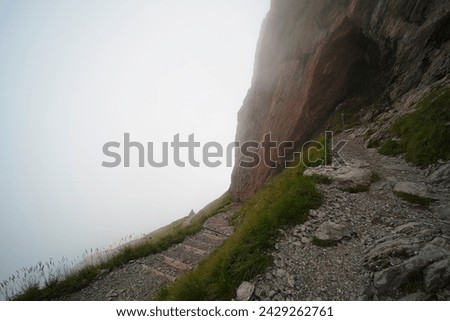 Hiking trail on the ,,Grosser Mythen" a beautiful mountain 1,898 m high in the canton of Schwyz in Switzerland.  Royalty-Free Stock Photo #2429262761