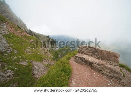 Hiking trail on the ,,Grosser Mythen" a beautiful mountain 1,898 m high in the canton of Schwyz in Switzerland.  Royalty-Free Stock Photo #2429262765