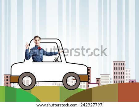Young funny man driving little drawn car