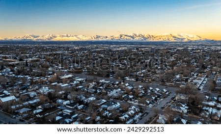 Scenic morning view of mountains range in Salt Lake city over the residential area