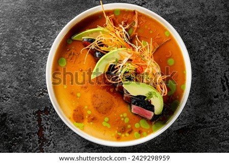 tuna tataki with vegetables and sauce on white plate Royalty-Free Stock Photo #2429298959