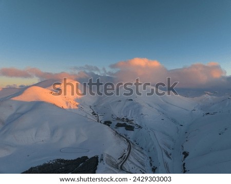 Palandöken Ski Center in the Colorful Sunset Lights Drone Photo, Winter Season Palandoken Mountains Erzurum, Turkiye (Turkey)