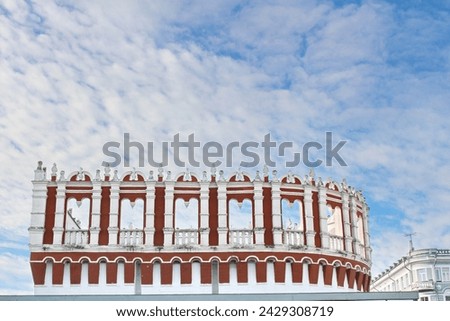 The Kutafya Tower of the Moscow Kremlin is an ancient defensive structure of red and white color against the sky. Brick architecture. Royalty-Free Stock Photo #2429308719