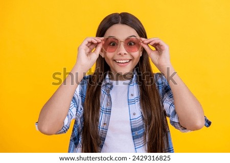 teen girl in casual style. Young teen girl standing in sunglasses. Beautiful teen girl wearing checkered shirt. teen girl with long hair. summer fashion style