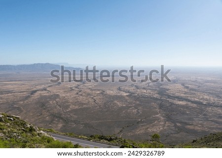 View from Vanrhyns Pass on Road R27 at the Northern Cape Province in South Africa under blue sky. Royalty-Free Stock Photo #2429326789