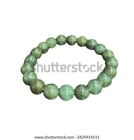 Green pearl stone in the white background.Isolated picture.