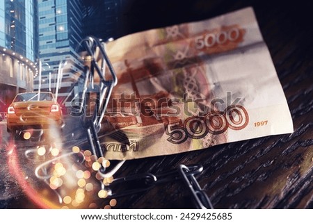 Business concept. The depreciation of the national currency. Bill with the inscription "5000 thousand rubles". Inflation and stagnation. Tighten russian bill with a measuring chain. Royalty-Free Stock Photo #2429425685