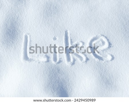 Like, snow and word in ice outdoor on ground in winter for communication on social media. Writing, sign and drawing on field in nature with frozen background and written sketch for love and care