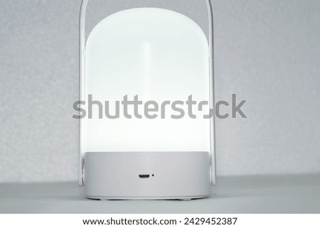 emergency lamp with a white rounded design