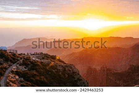 Beautiful sunrise in Madeira highest mountains range. Hiking trial from Pico do Areerio to Pico do Ruivo. Madeira, Portugal Royalty-Free Stock Photo #2429463253