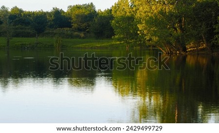 Beautiful lake in the Chalosse region, across the Adour river, during the sunset