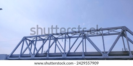 Close up view of small steel railway bridge. Royalty-Free Stock Photo #2429557909