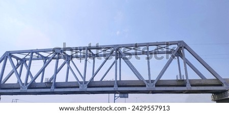 Close up view of small steel railway bridge. Royalty-Free Stock Photo #2429557913