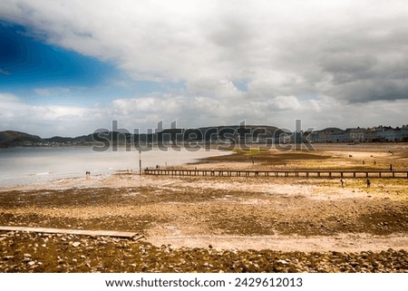 Beach in historical and victorian seafront town of Llandudno, North Wales. HDR.