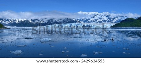Cloud inversion and the Hubbard Glaicer Royalty-Free Stock Photo #2429634555