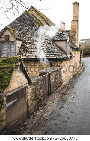 Beautiful Cottages in Snowshill Manor Village, Broadway, The Cotswolds, Gloucestershire Royalty-Free Stock Photo #2429650775