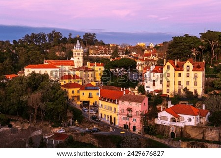 Sintra, Portugal. Panorama of the beautiful historical town near Lisbon. Colorful sunset over famous Sintra. Royalty-Free Stock Photo #2429676827