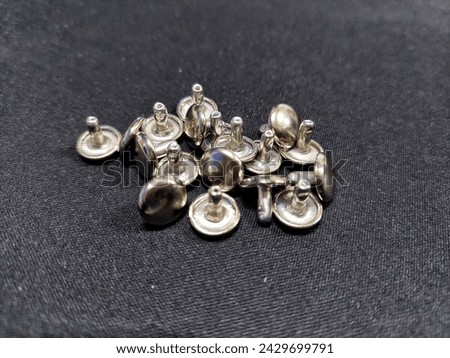 Image of screw buttons used for a variety of jeans